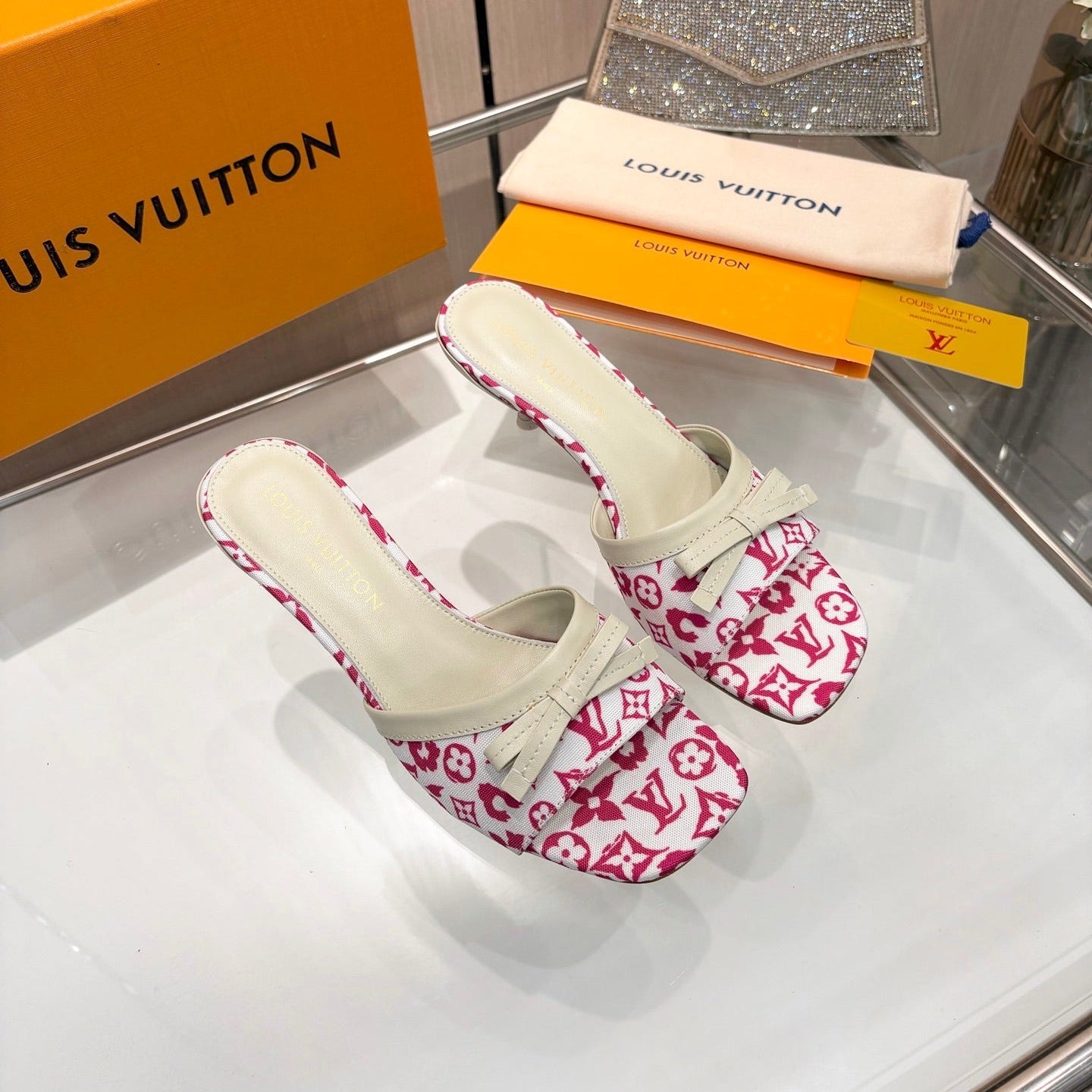 LV 26S HIGH-HEELED MULES 55 MM IN WHITE AND PINK MONOGRAM CANVAS
