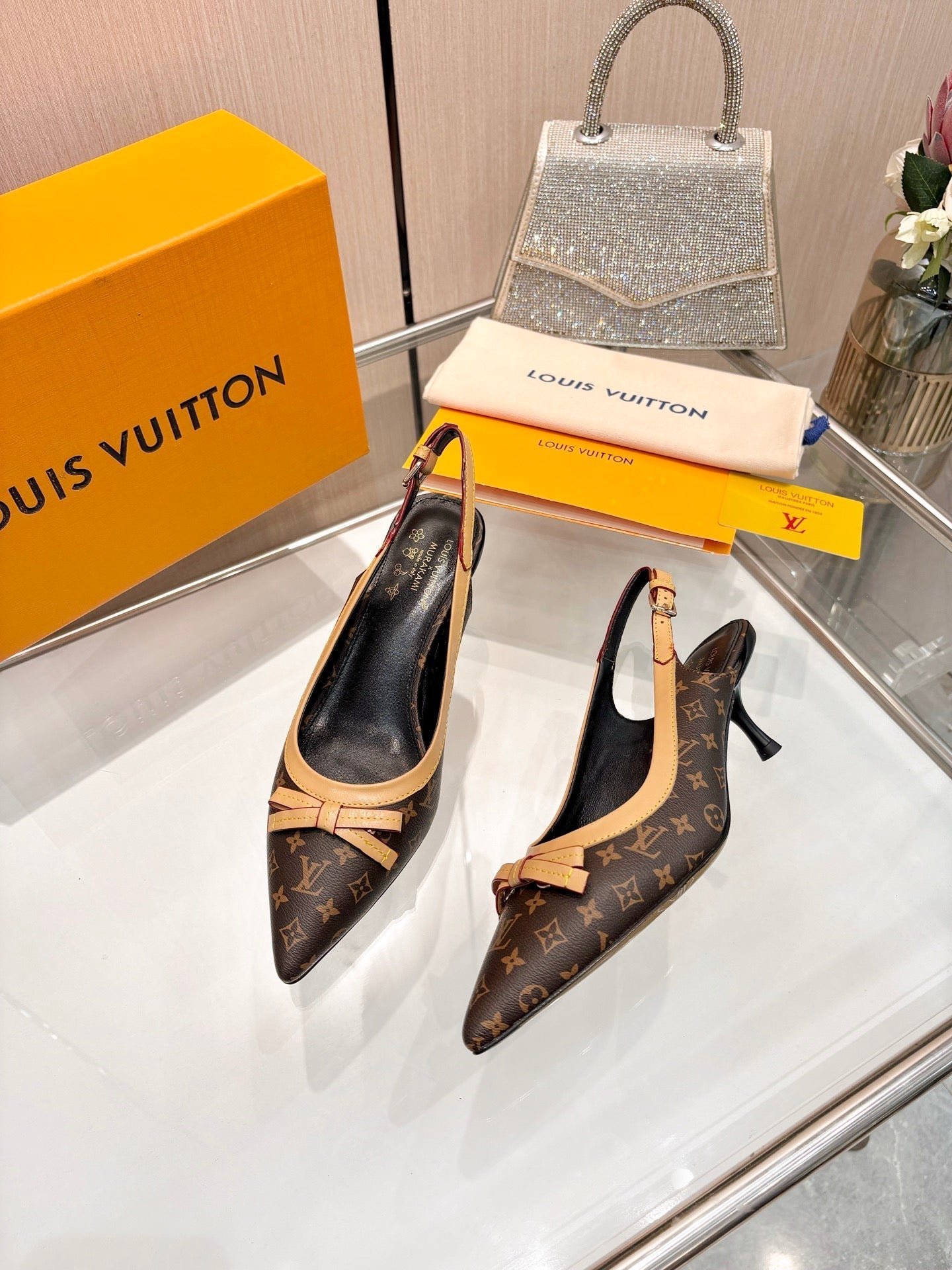 LV 26S BOW-DETAIL SLINGBACK PUMPS 55 MM IN DARK BROWN MONOGRAM CANVAS
