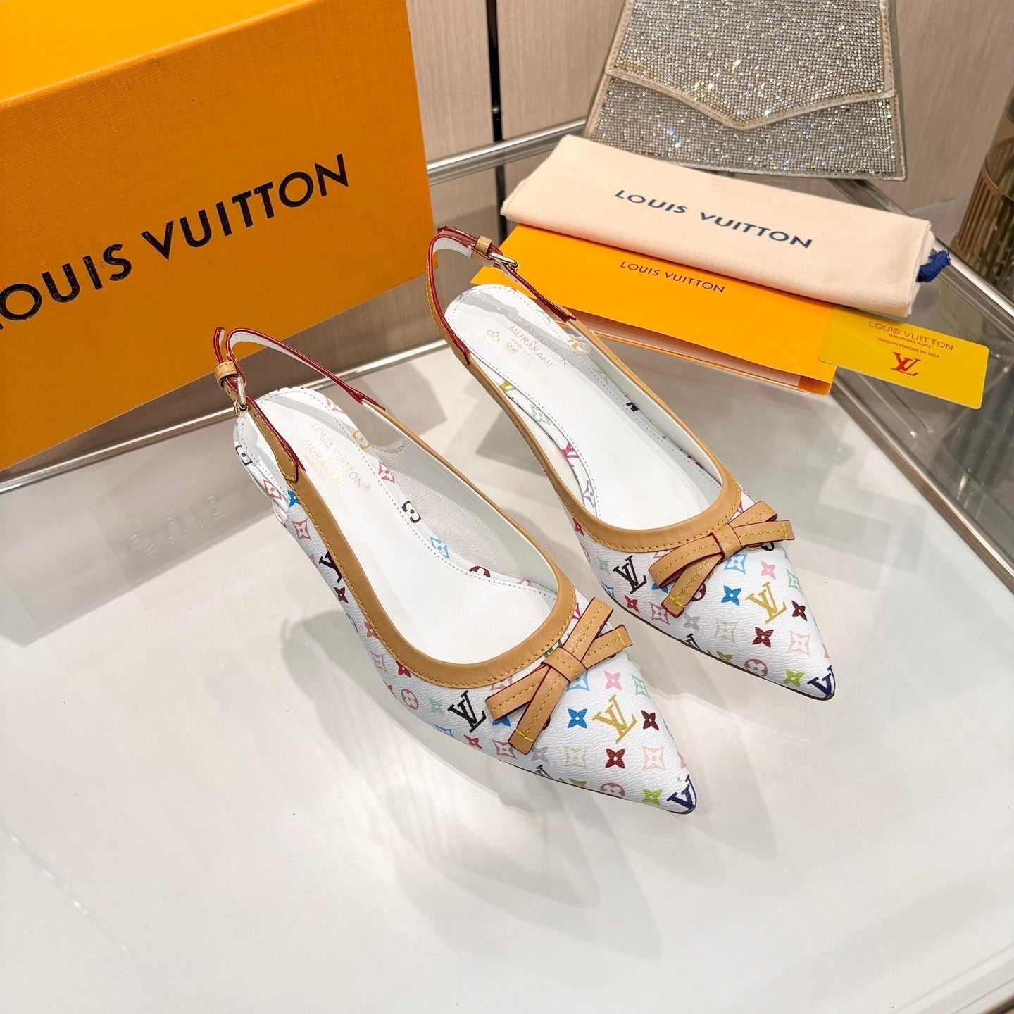 LV 26S BOW-DETAIL SLINGBACK PUMPS 55 MM IN MULTICOLOR MONOGRAM CANVAS