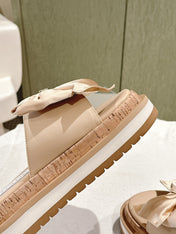 CC SLIPPERS WITH SILK BOW IN BEIGE ALMOND COWHIDE