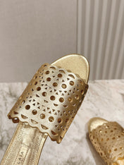 ALAIA PERFORATED SLIDE SANDALS 25S IN LIGHT GOLD LAMBSKIN