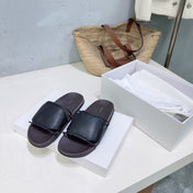 THE ROW 26S STRAP SLIDES IN BLACK CALFSKIN