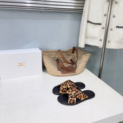 THE ROW 26S SLIDES SANDALS IN LEOPARD CALF HAIR CROSS STRAP