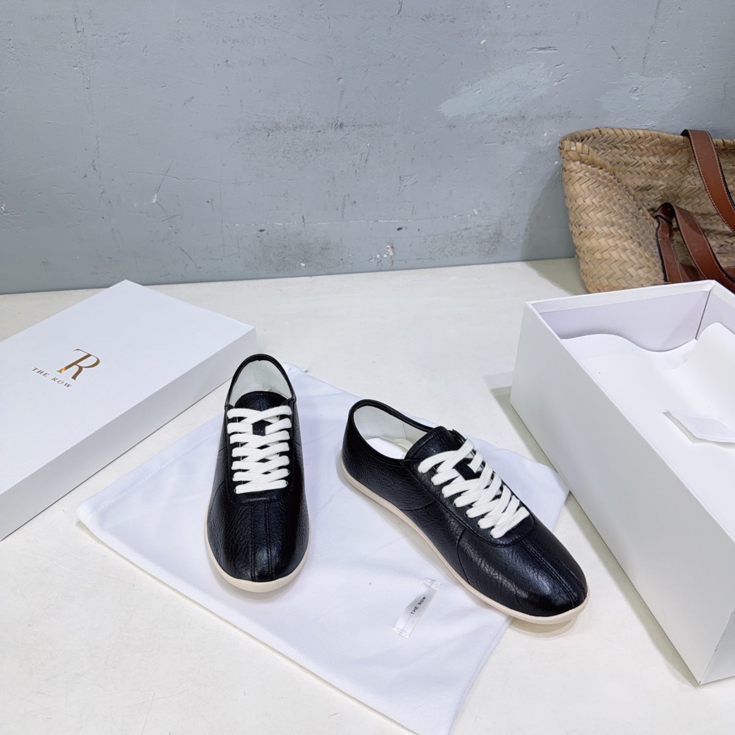 THE ROW 26S LACE-UP SNEAKERS IN BLACK GRAINED CALFSKIN