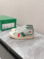 ELIOT SNEAKER IN GREEN PASTEL CANVAS AND CALFSKIN