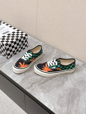 VALENTINO 25S GARAVANI X VANS SNEAKERS IN GREEN MIX BLACK CANVAS
