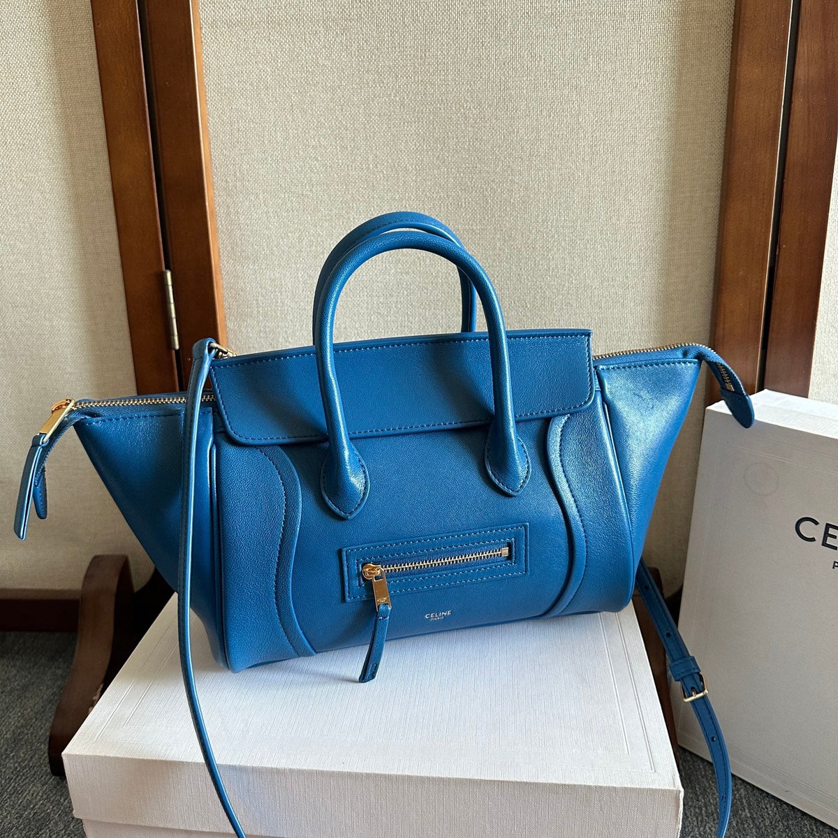 CELINE 25S NEW LUGGAGE 36MM IN DARK BLUE CALFSKIN GOLD HARDWARE