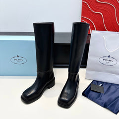 PRADA 25S SQUARE-TOE HIGH-CUT BOOTS IN BLACK CALFSKIN