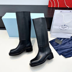 PRADA 25S SQUARE-TOE HIGH-CUT BOOTS IN BLACK CALFSKIN