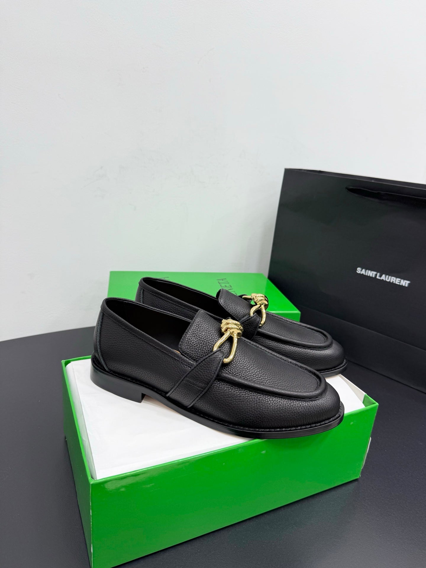 BOTTEGA VENETA 26S LOAFERS IN BLACK GRAINED CALFSKIN WITH GOLD HARDWARE