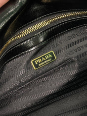 HANDBAG 31 IN BLACK OIL WAX LAMBSKIN