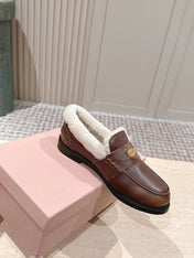 MIUMIU 25S PENNY LOAFERS 20MM IN EBONY BROWN BLEACHED CALFSKIN WITH SHEARLING