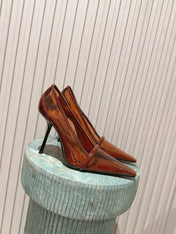 YSL 26S POINTED-TOE PUMPS 100 MM IN TRANSPARENT BROWN TPU