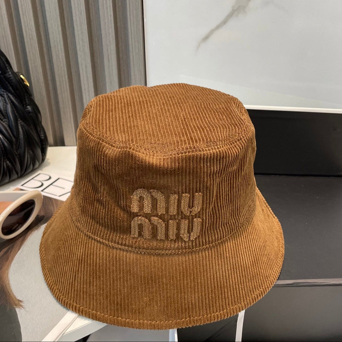 MM BUCKET IN BURNT ORANGE VELVET WITH LOGO