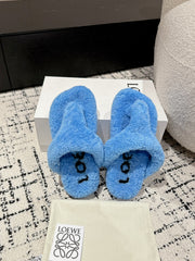 LW SHEARLING THONG SLIPPER IN LAPIS