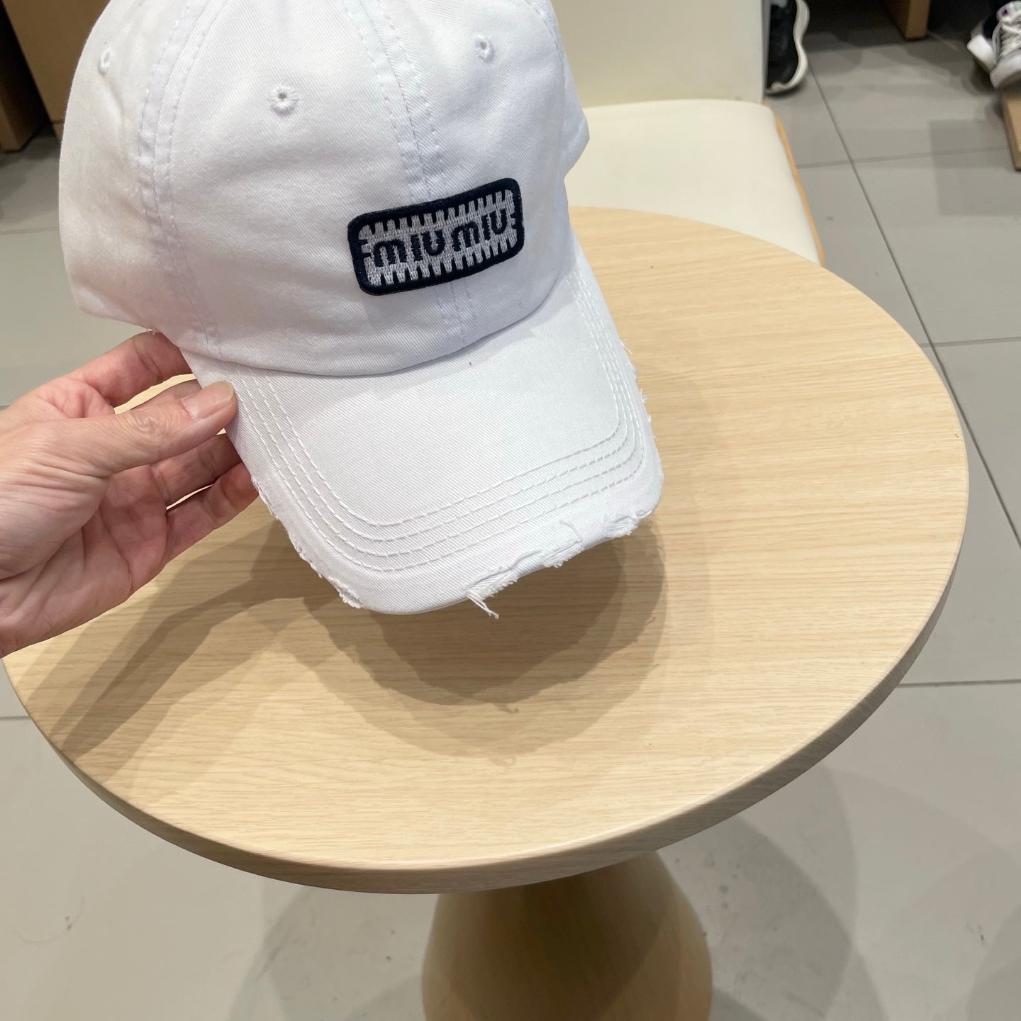 MM DISTRESSED FABRIC BASEBALL CAP IN WHITE WITH EMBROIDERED LOGO