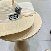 MM WIDE-BRIM BEACH HAT IN LIGHT BEIGE WITH FABRIC BOW