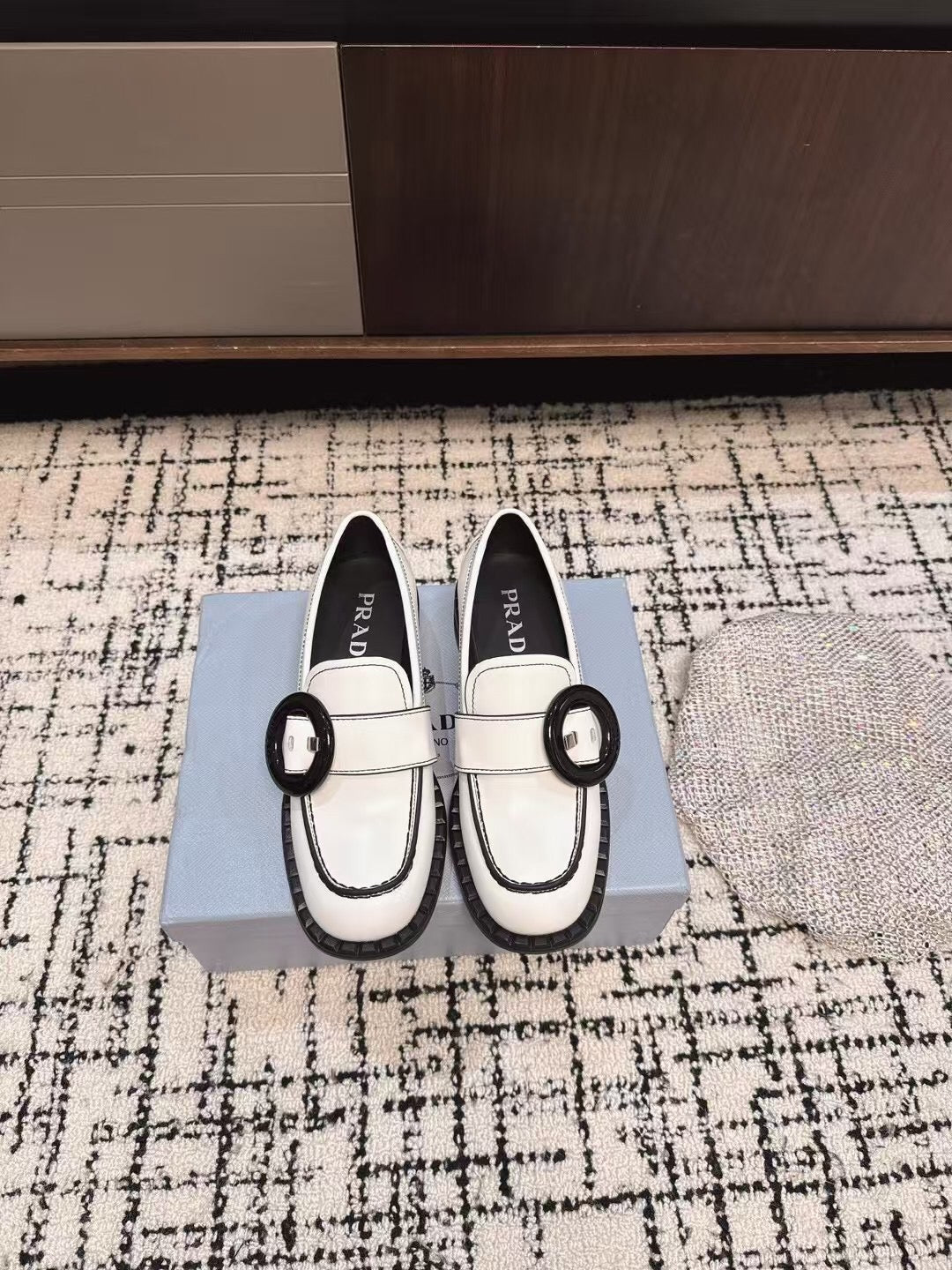 PRADA 26S BUCKLED LOAFERS IN WHITE CALFSKIN