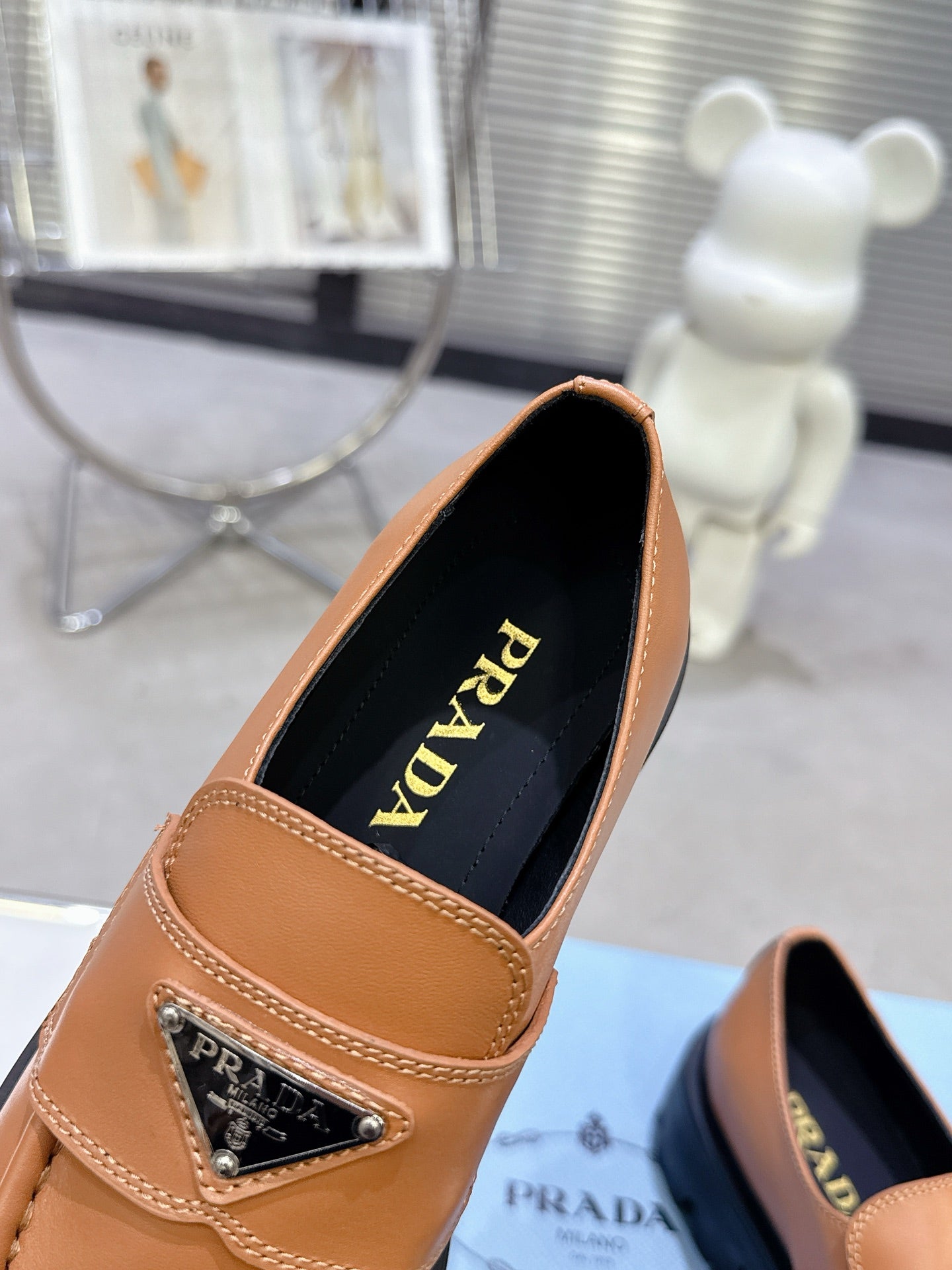 PRADA 25S THICK-SOLE LOAFERS 60 MM IN COGNAC BROWN CALFSKIN