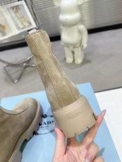 PRADA 25S ZIP-UP ANKLE BOOTS IN BEIGE SUEDE