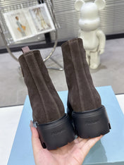 PRADA 25S ZIP-UP ANKLE BOOTS IN DARK BROWN SUEDE