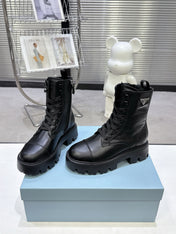 PRADA 25S WARRIOR BOOTS IN BLACK CALFSKIN