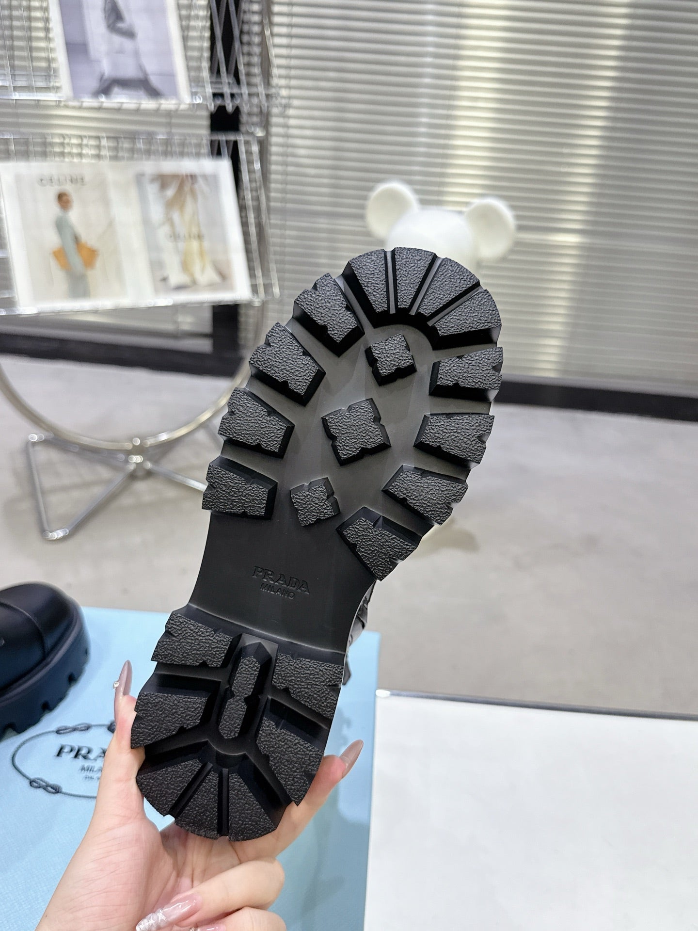 PRADA 25S WARRIOR BOOTS IN BLACK CALFSKIN