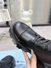 PRADA 25S WARRIOR BOOTS IN BLACK CALFSKIN