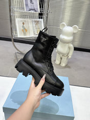 PRADA 25S WARRIOR BOOTS IN BLACK CALFSKIN