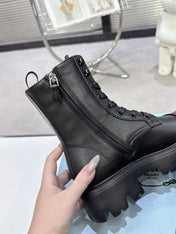 PRADA 25S WARRIOR BOOTS IN BLACK CALFSKIN