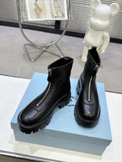 PRADA 25S ZIP-UP ANKLE BOOTS IN BLACK CALFSKIN