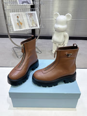 PRADA 25S ZIP-UP ANKLE BOOTS IN BROWN CALFSKIN