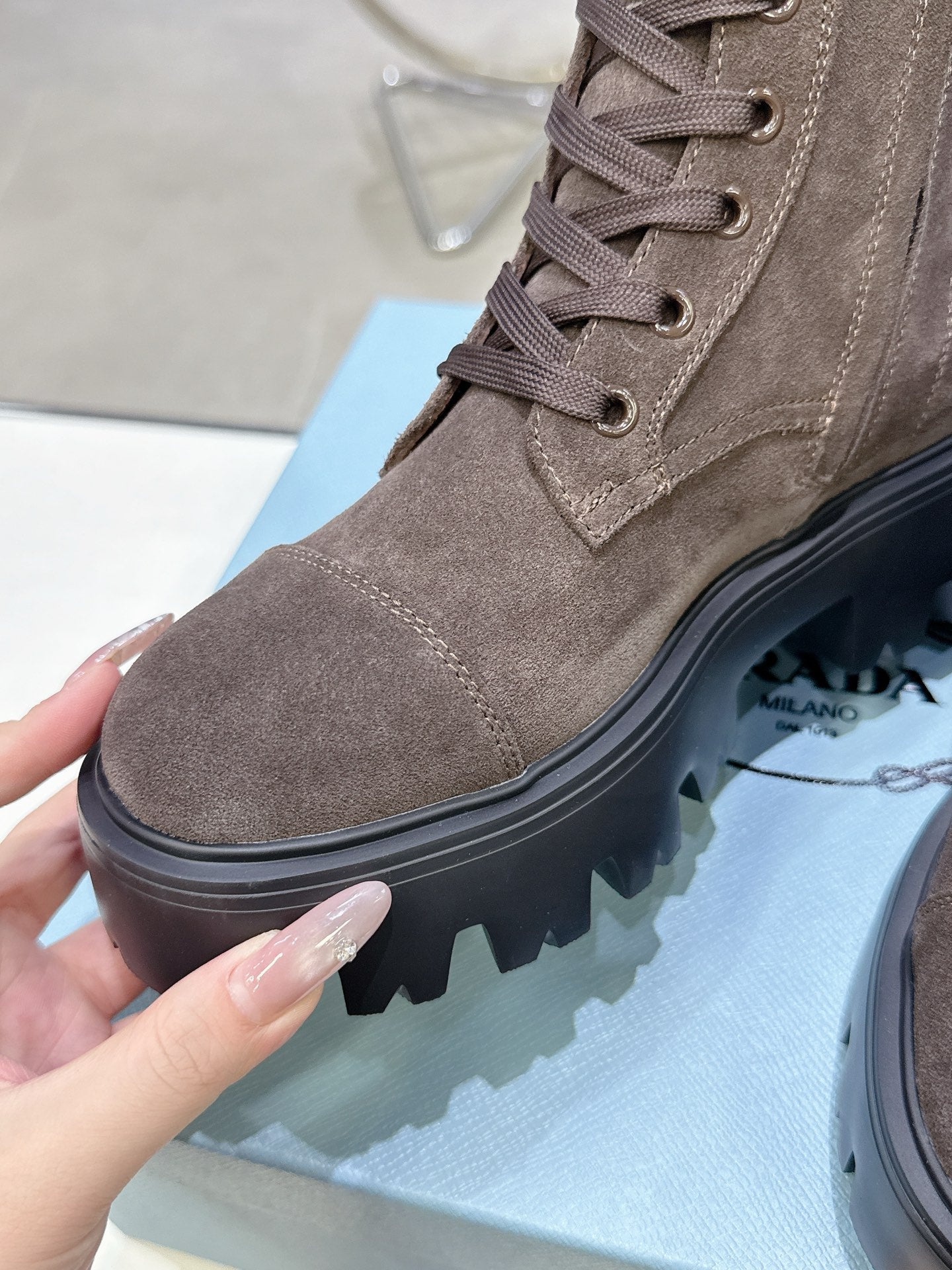 PRADA 25S WARRIOR BOOTS IN DARK BROWN SUEDE