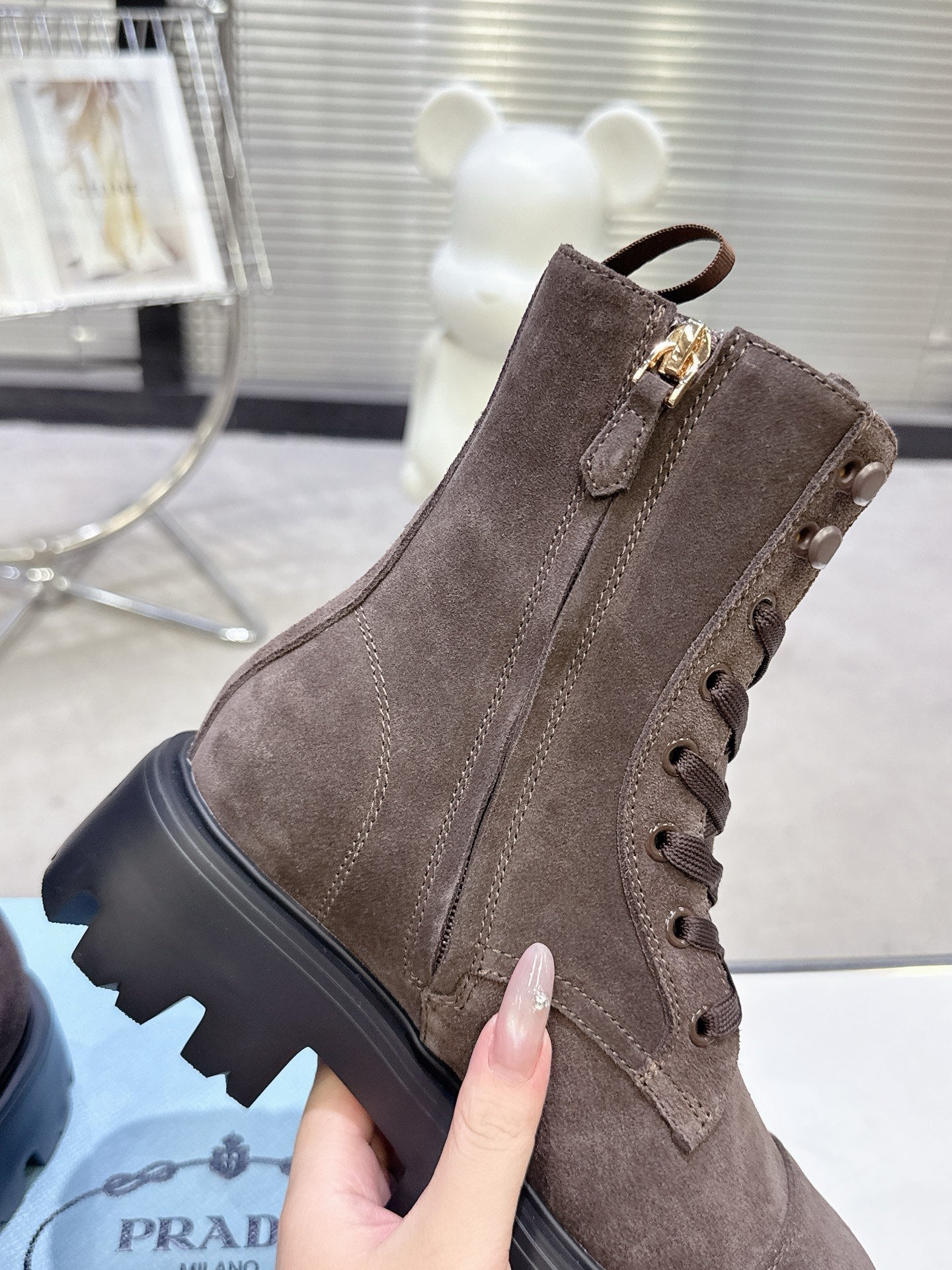 PRADA 25S WARRIOR BOOTS IN DARK BROWN SUEDE