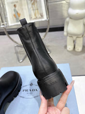 PRADA 25S RETRO PLATFORM MARTIN ANKLE BOOTS IN BLACK CALFSKIN