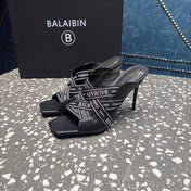 BALMAIN 26S HIGH-HEEL SANDALS 95 MM IN BLACK CALFSKIN AND FABRIC
