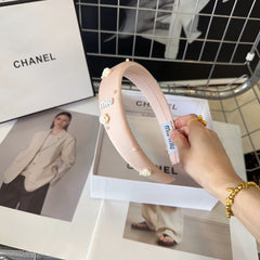 HEADBAND EMBELLISHED FLOWER AND PEARL IN LIGHT PINK SILK 194315