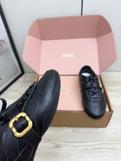 MIUMIU 26S BUCKLE SNEAKERS IN BLACK CALFSKIN WITH GOLD HARDWARE
