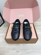 MIUMIU 26S BUCKLE SNEAKERS IN BLACK CALFSKIN WITH GOLD HARDWARE