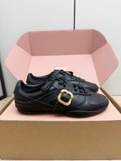 MIUMIU 26S BUCKLE SNEAKERS IN BLACK CALFSKIN WITH GOLD HARDWARE