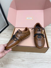 MIUMIU 26S BUCKLE SNEAKERS IN BROWN CALFSKIN WITH GOLD HARDWARE