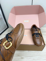 MIUMIU 26S BUCKLE SNEAKERS IN BROWN CALFSKIN WITH GOLD HARDWARE