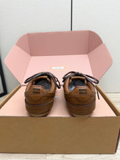 MIUMIU 26S BUCKLE SNEAKERS IN BROWN CALFSKIN WITH GOLD HARDWARE