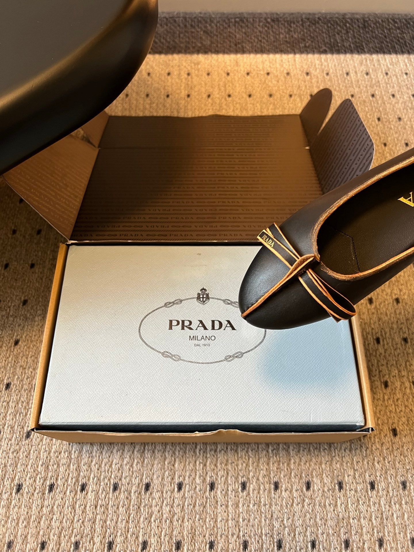 PRADA 26S POINTED TOE BOW FLATS IN BLACK CALFSKIN