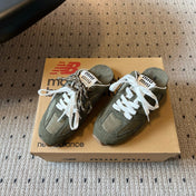 MIUMIU 26S SNEAKER MULES IN MOSS GREEN SUEDE MIX FABRIC