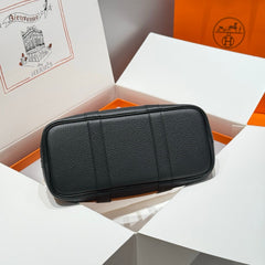 GARDEN PARTY 30CM IN ORANGE MINIMUM TOILETS COTTON CANVAS AND BLACK CALFSKIN