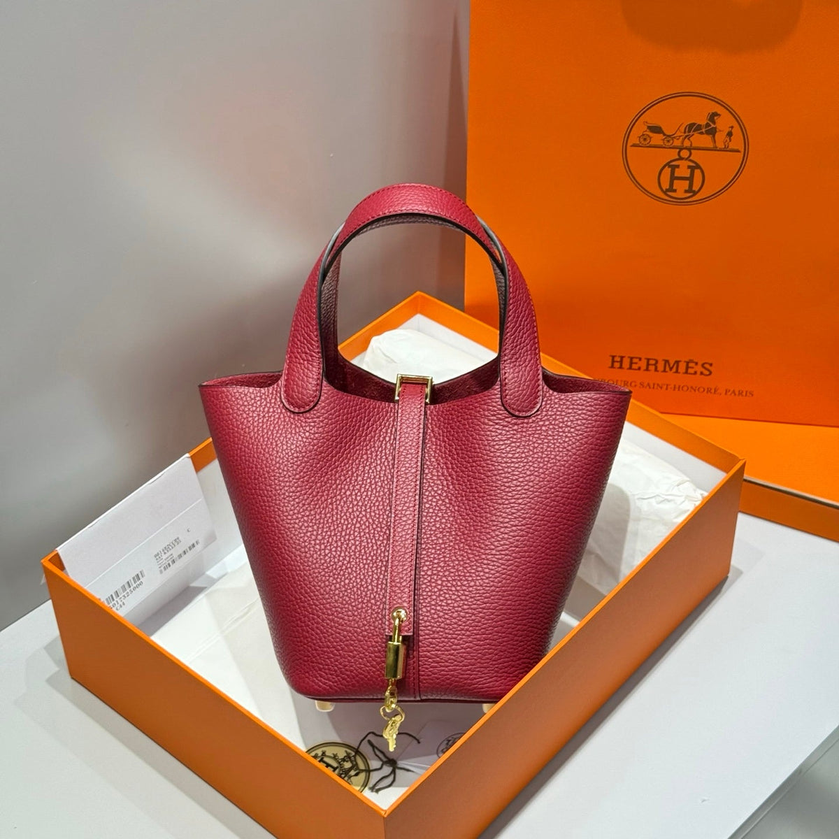 HERMES 25S PICOTIN LOCK 18 IN ROSSO ANCORA RED CALFSKIN GOLD HARDWARE