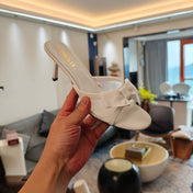 PRADA 26S HEEL MULE SANDALS 75MM IN WHITE CALFSKIN WITH BOW