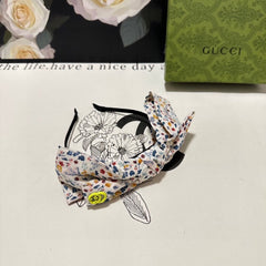 HAIRBAND IN WHITE FLORAL FABRIC 385855