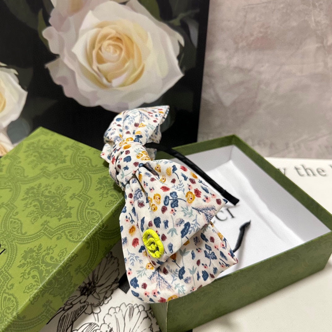 HAIRBAND IN WHITE FLORAL FABRIC 385855